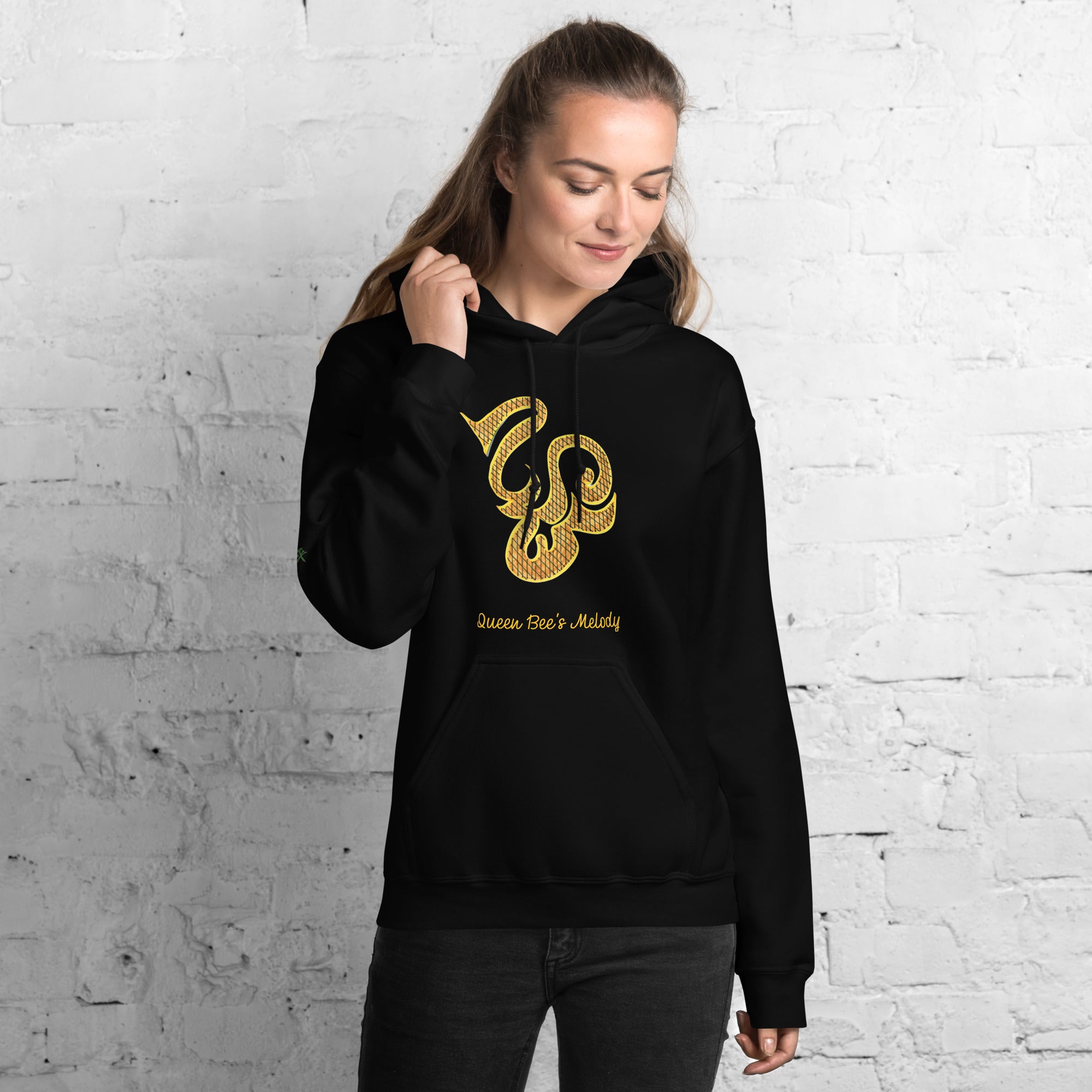 Black hoodie featuring Queen Bee's Melody original FuncChanel healing art printed front center with artwork title, 平和 peace kanji on the right sleeve — wearable art by Heiwa